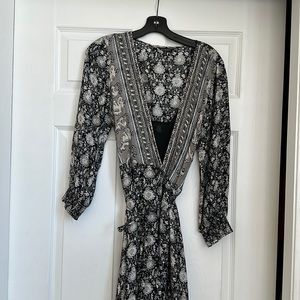 Beautiful Lucky Brand wrap dress. Attached slip. Only worn once!